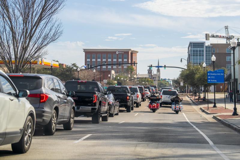 busy traffic full of cars and motorcycles in wilmington north carolina